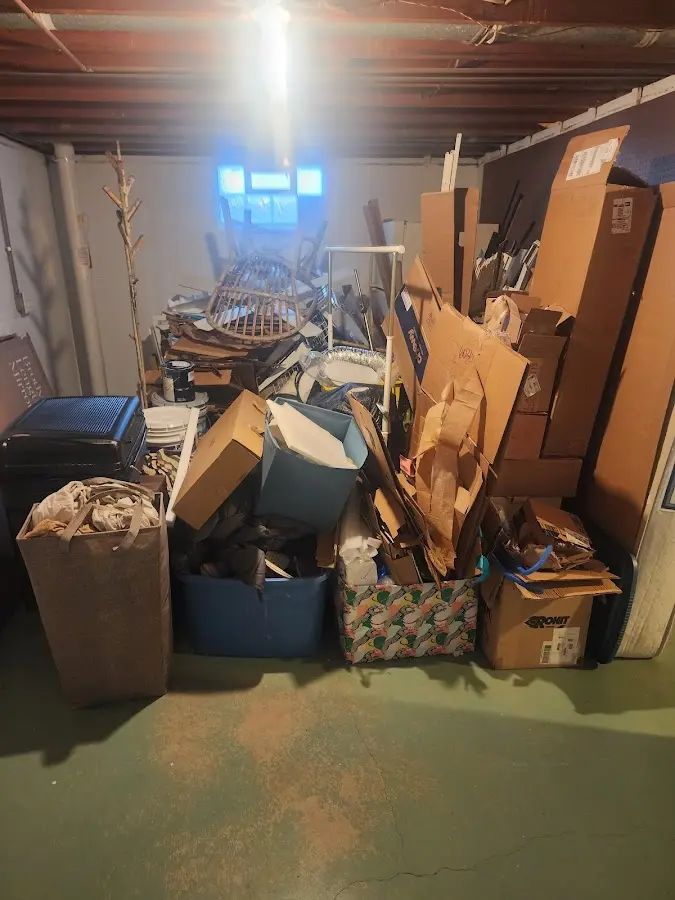 Roll-off dumpster container at job site for 2 Yard Dumpster Rental in Powder Springs